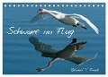 Schwäne im Flug (Tischkalender 2024 DIN A5 quer), CALVENDO Monatskalender - Roland T. Frank