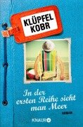 In der ersten Reihe sieht man Meer - Volker Klüpfel, Michael Kobr