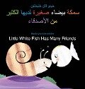 Cover-Bild zum Titel 'Little White Fish Has Many Friends / سمكة بيضاء صغيرة لديها الكثير من الأ&#1' von 'Guido Van Genechten'